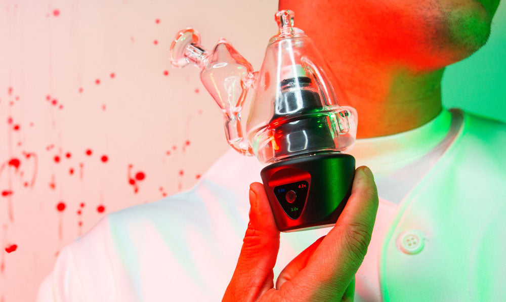 Man holding Sutra DBR Pro in front of bloody background