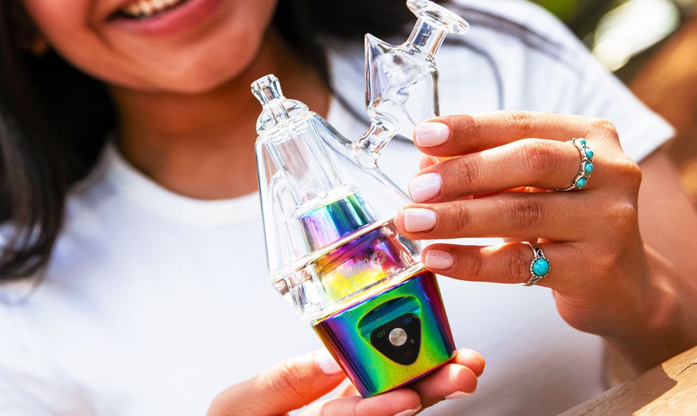 Woman holding Sutra DBR Pro outside