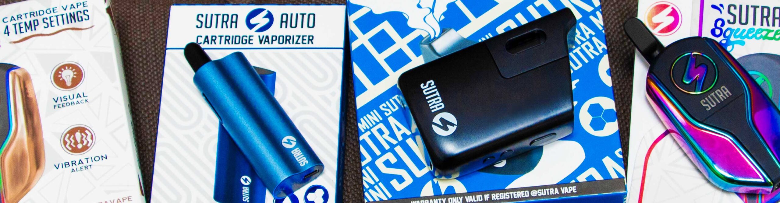 Sutra Vape Products laying on table with packaging